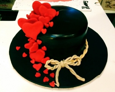 HAT DESIGN WITH FLOWING RED HEARTS 